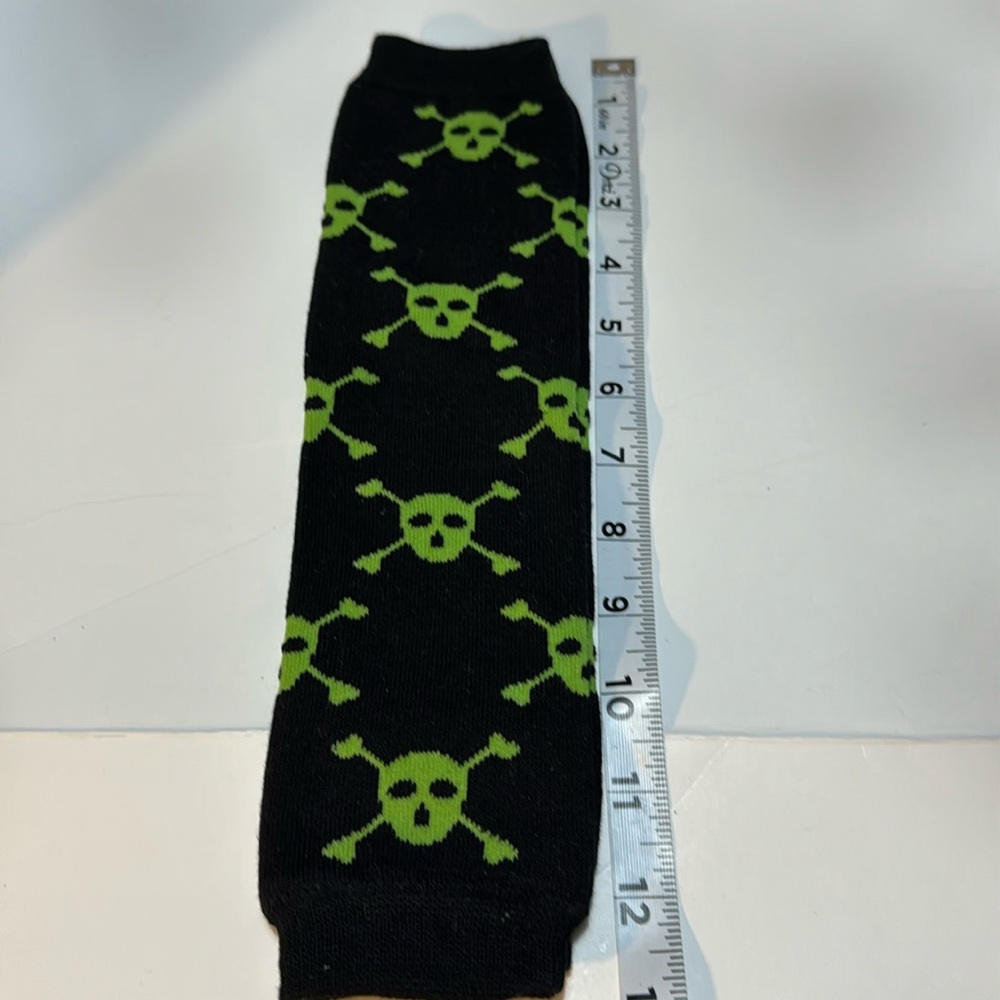 leg warmer, green skull head design. warm and protects knees Halloween NWOT